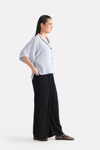 Black bubble georgette trouser, alternate angle, by SOLA Pakistan.