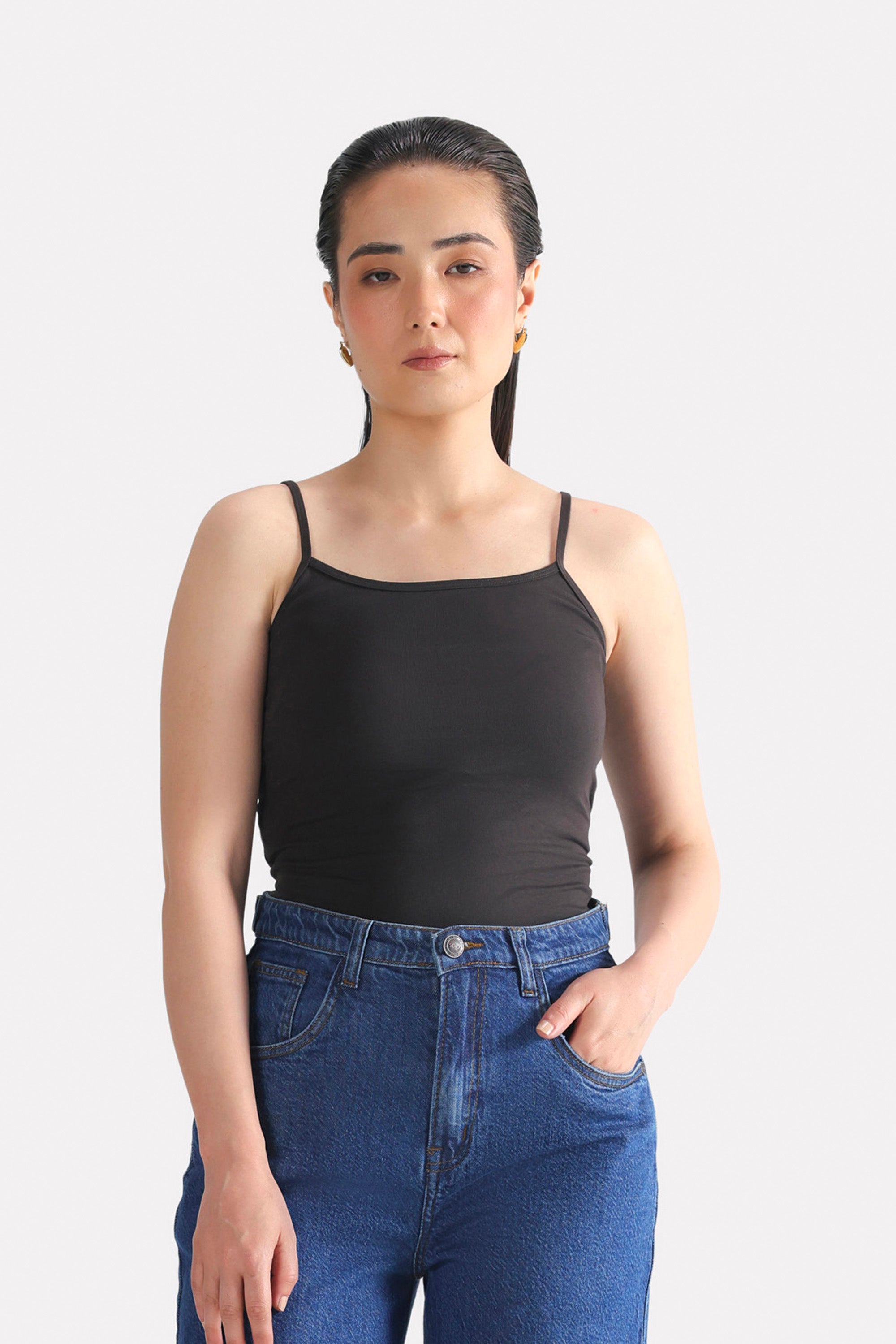 Black camisole in cotton, worn by a model, by SOLA Pakistan.