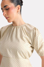 Black dotted print puff sleeve polka dot shirt shown in a styled fit, by SOLA Pakistan.