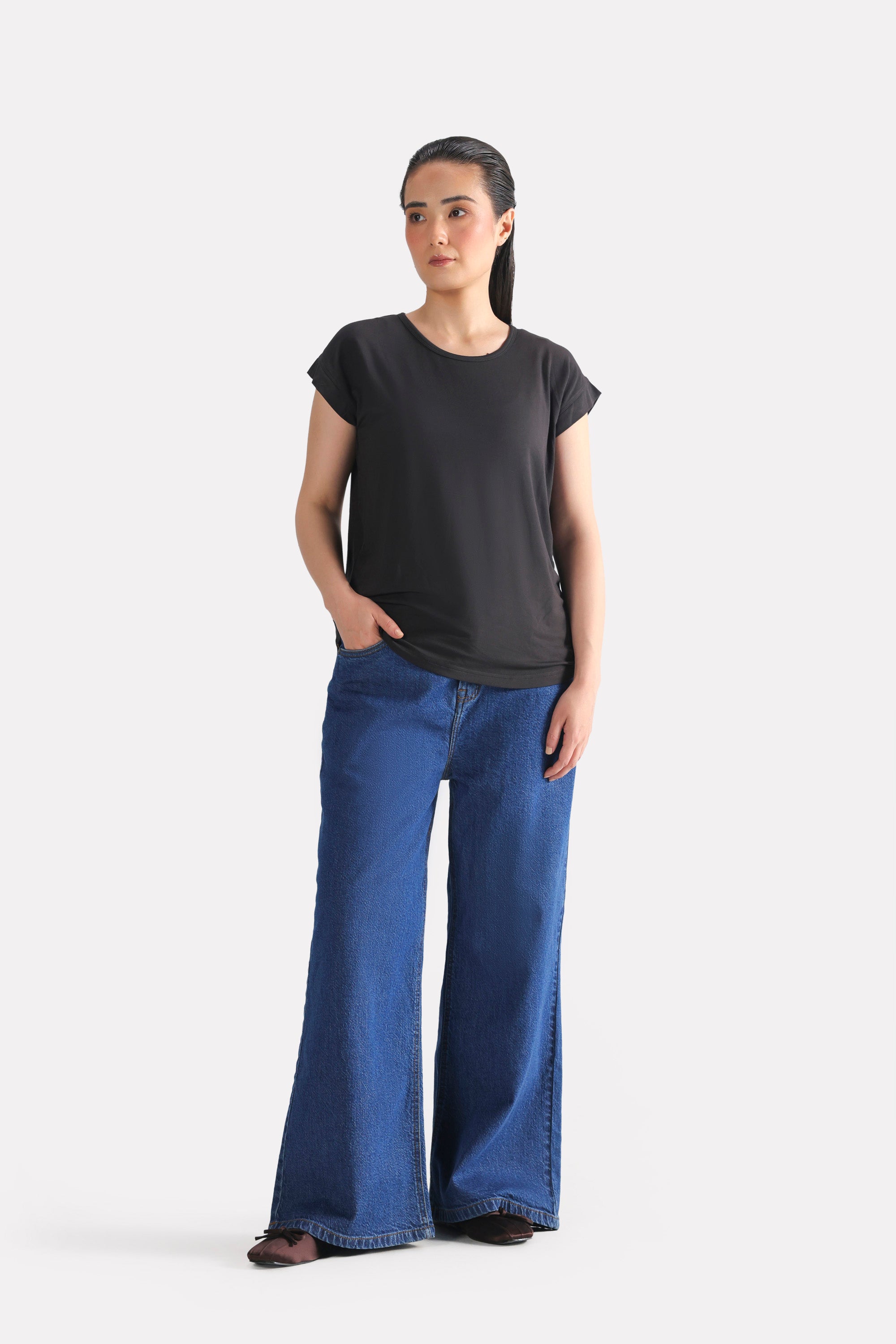 Black featherweight modal t-shirt, full styled look, by SOLA Pakistan.