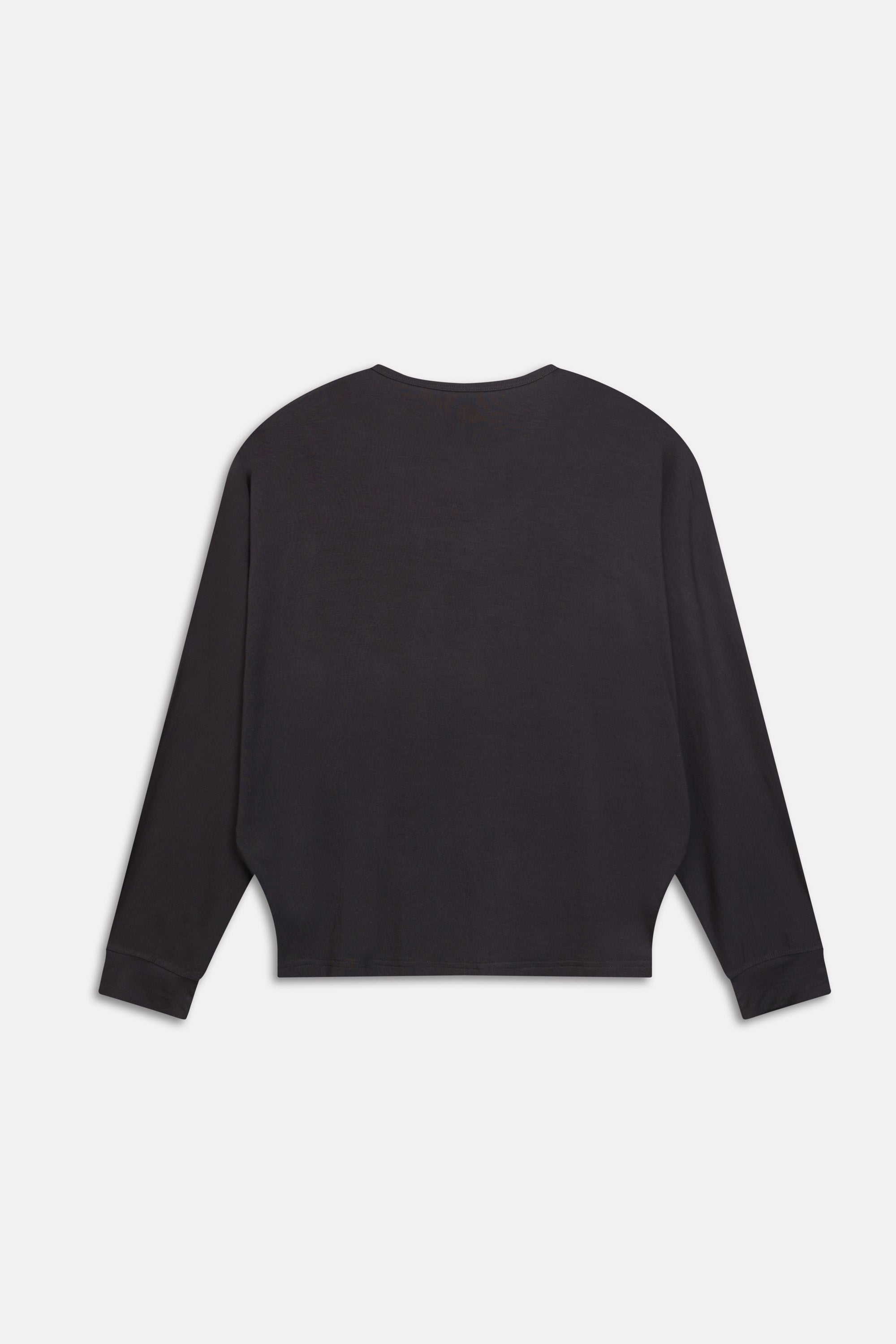 Flat lay of the black fluid sleeve t-shirt, by SOLA Pakistan.