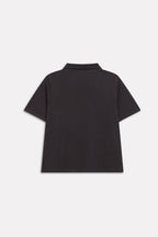 Flat lay of the black jhonny collar polo t-shirt, by SOLA Pakistan.