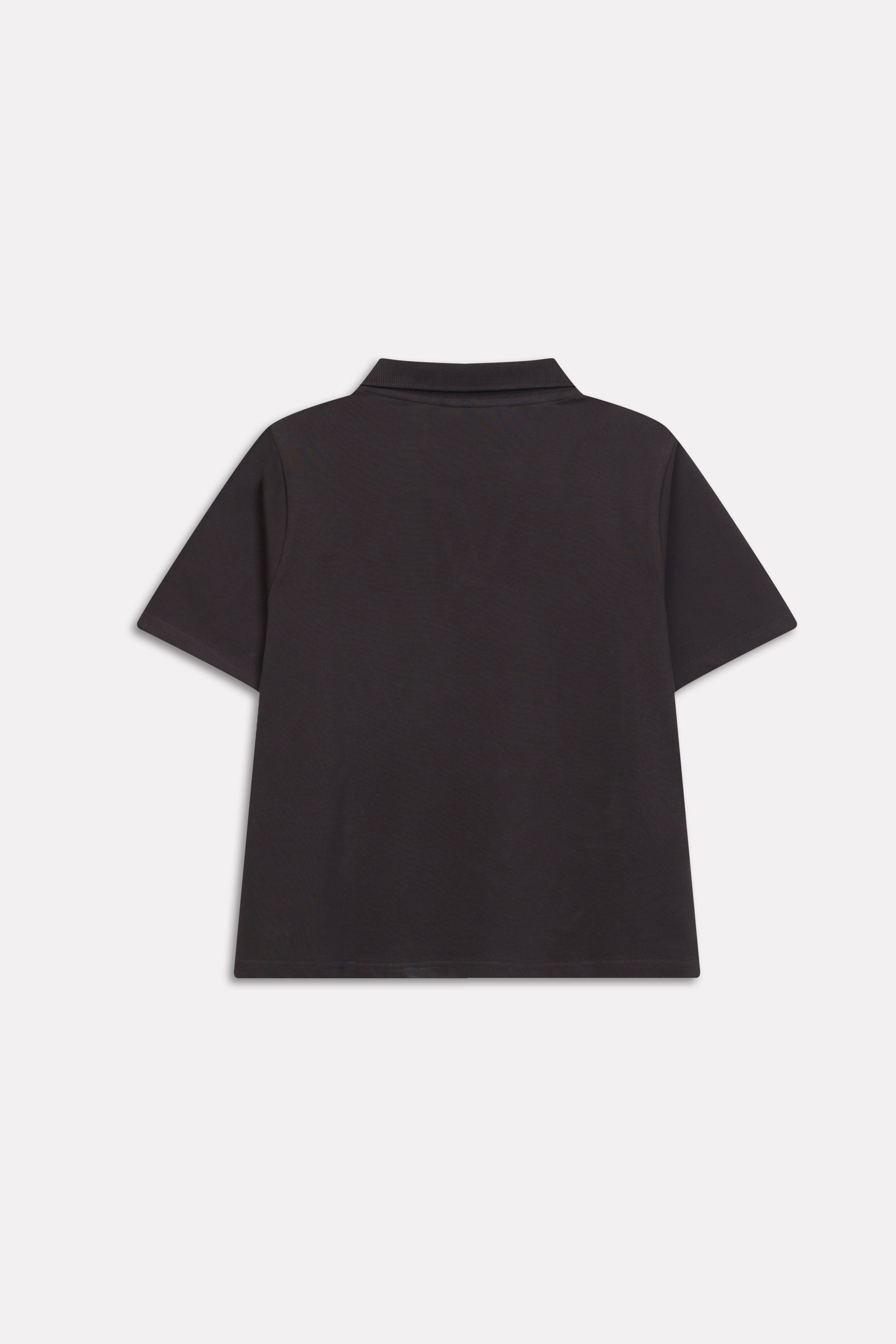 Flat lay of the black jhonny collar polo t-shirt, by SOLA Pakistan.