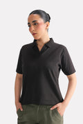 Black jhonny collar polo t-shirt in cotton, worn by a model, by SOLA Pakistan.