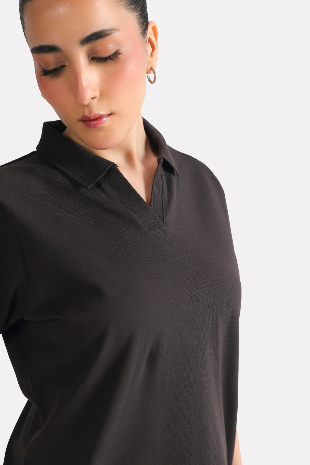 Texture and fabric detail, black jhonny collar polo t-shirt, by SOLA Pakistan.
