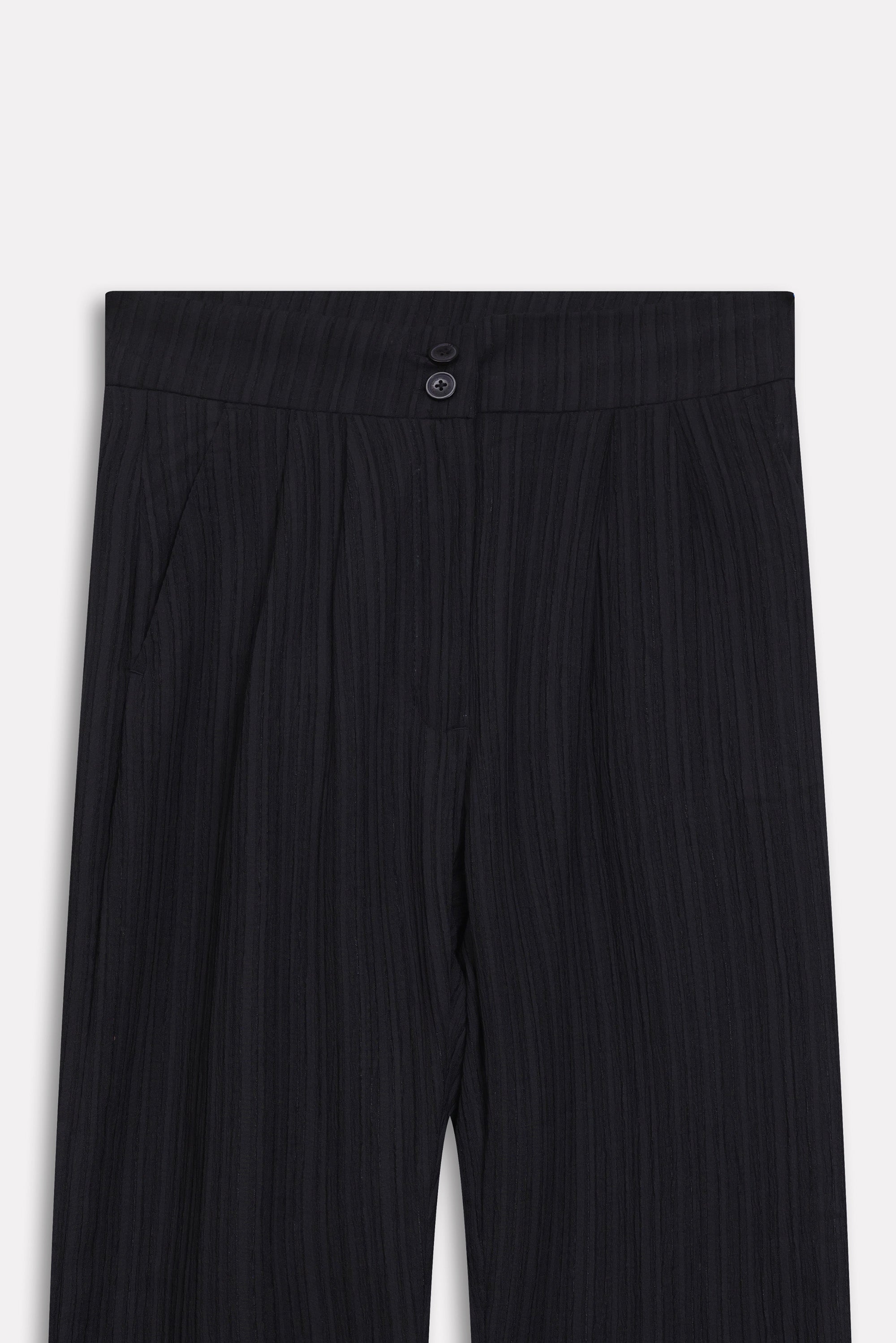 Close-up detail on the black retro wide-leg trouser, by SOLA Pakistan.