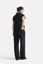 Flat lay of the black retro wide-leg trouser, by SOLA Pakistan.