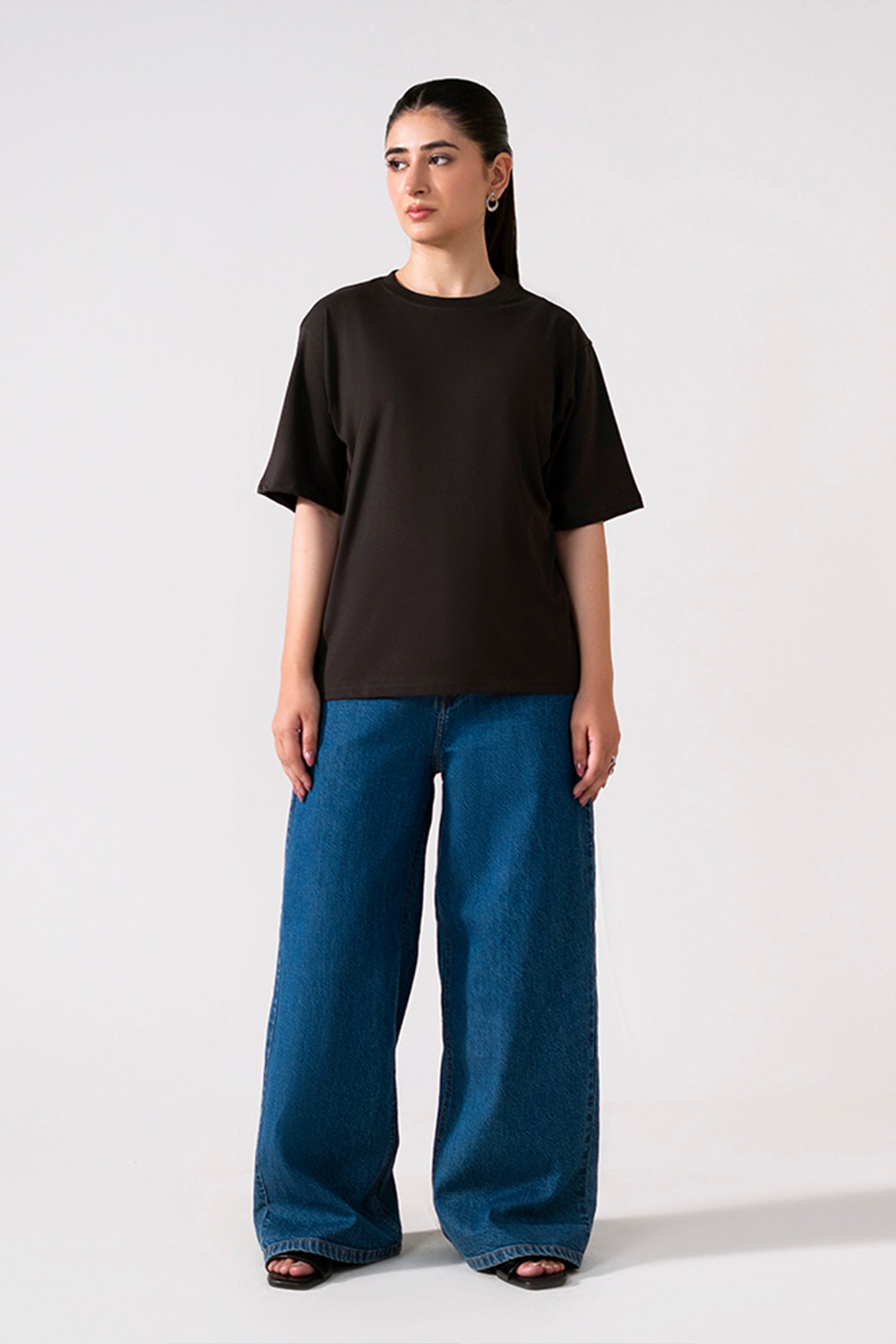 Black round neck t-shirt, full styled look, by SOLA Pakistan.
