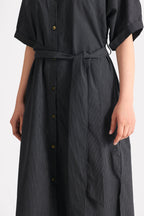 Black & white stripe striped cotton belted dress shown in a styled fit, by SOLA Pakistan.