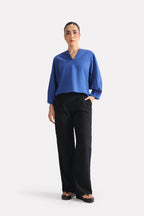 Blue (french blue) balloon sleeve relaxed top, alternate angle, by SOLA Pakistan.