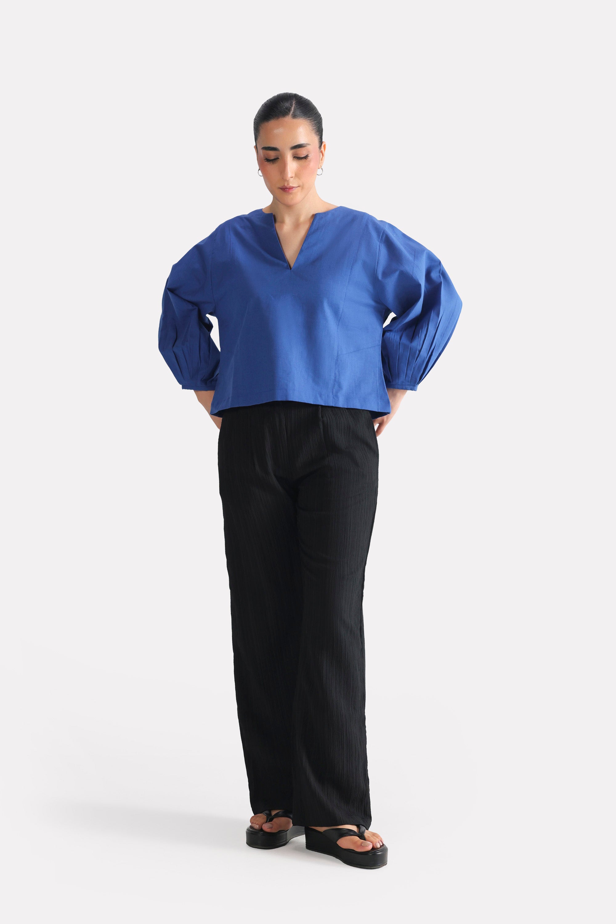 Blue (french blue) balloon sleeve relaxed top, full styled look, by SOLA Pakistan.