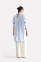 Close-up detail on the blue & white stripe oversized boyfriend shirt, by SOLA Pakistan.