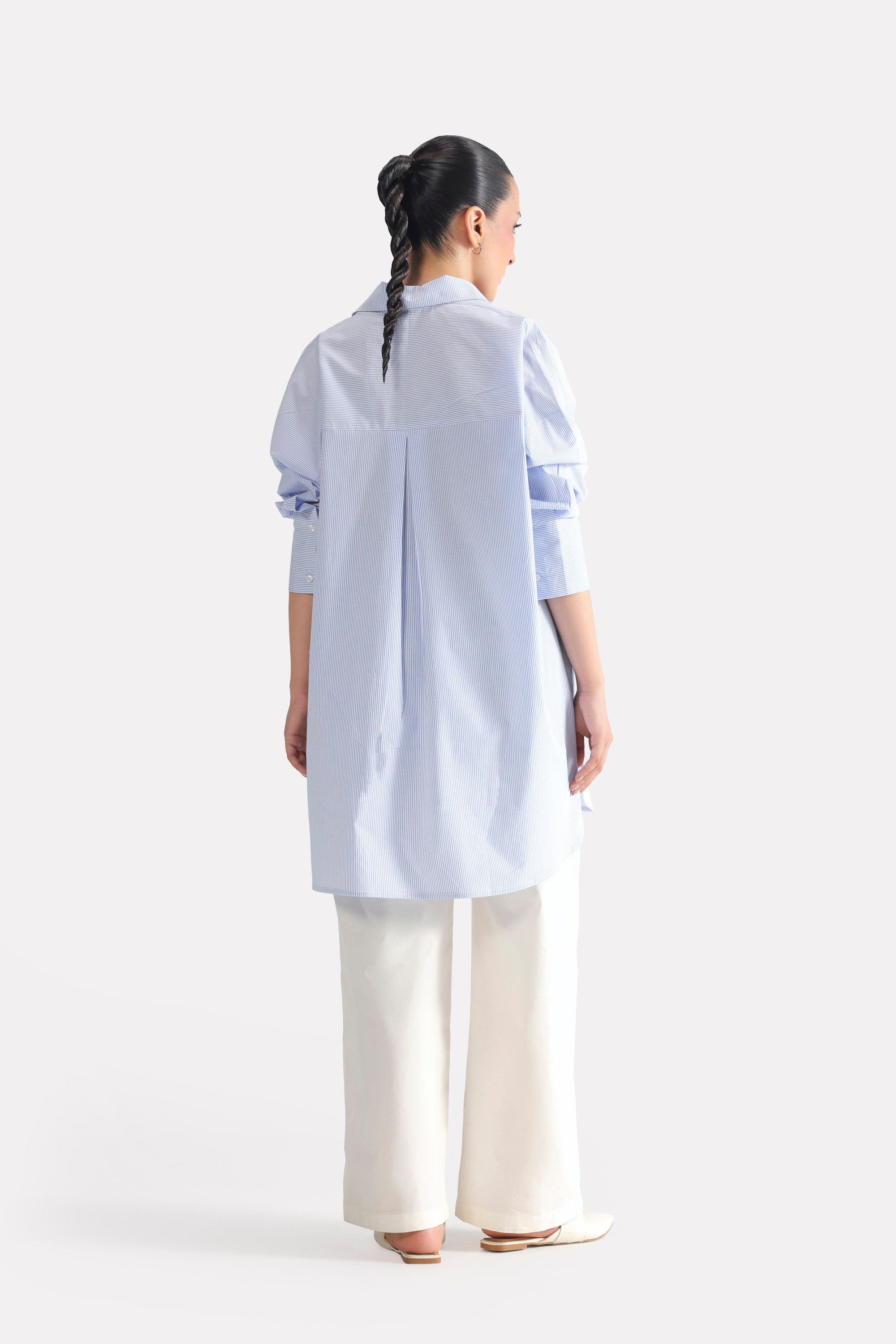 Close-up detail on the blue & white stripe oversized boyfriend shirt, by SOLA Pakistan.