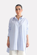 Blue & white stripe oversized boyfriend shirt in cotton, worn by a model, by SOLA Pakistan.