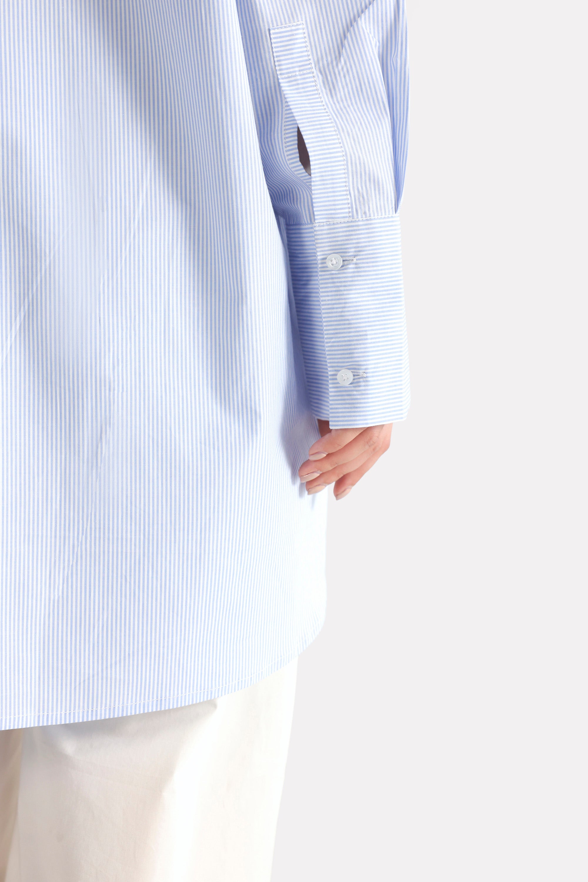 Texture and fabric detail, blue & white stripe oversized boyfriend shirt, by SOLA Pakistan.