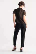 Flat lay of the chocolate brown drapped high neck asymmetrical, by SOLA Pakistan.