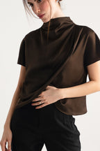 Chocolate brown drapped high neck asymmetrical, full styled look, by SOLA Pakistan.