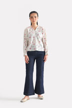 Dark blue bootcut denim jean in cotton, worn by a model, by SOLA Pakistan.