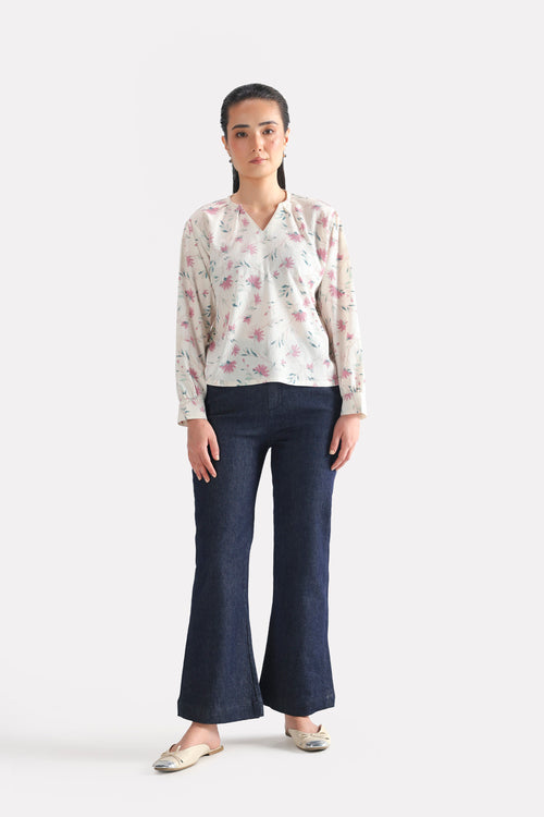 Dark blue bootcut denim jean in cotton, worn by a model, by SOLA Pakistan.