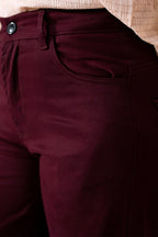 Dark purple (plum) flared pant shown in a styled fit, by SOLA Pakistan.