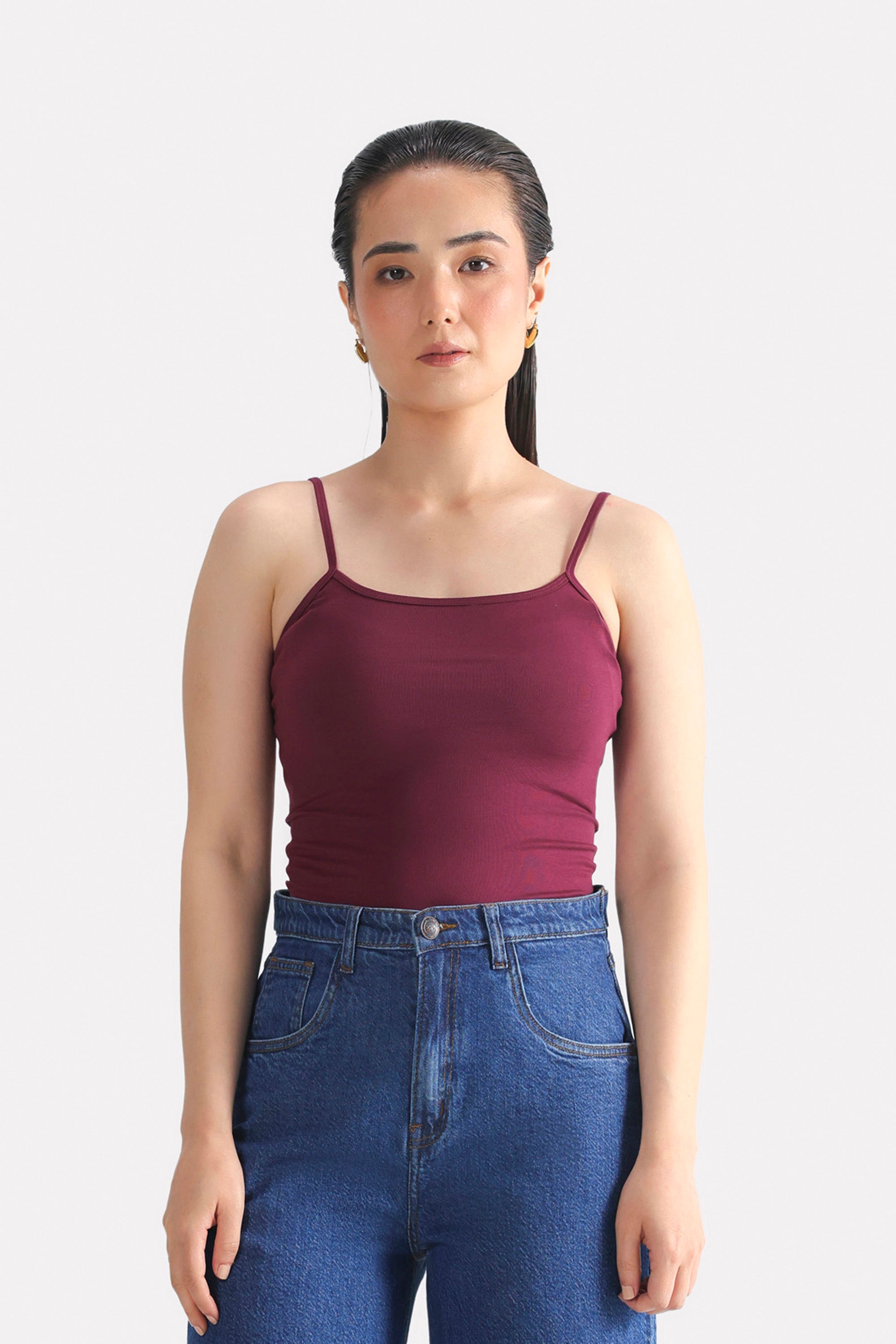 Dark red (burgundy) camisole in cotton, worn by a model, by SOLA Pakistan.