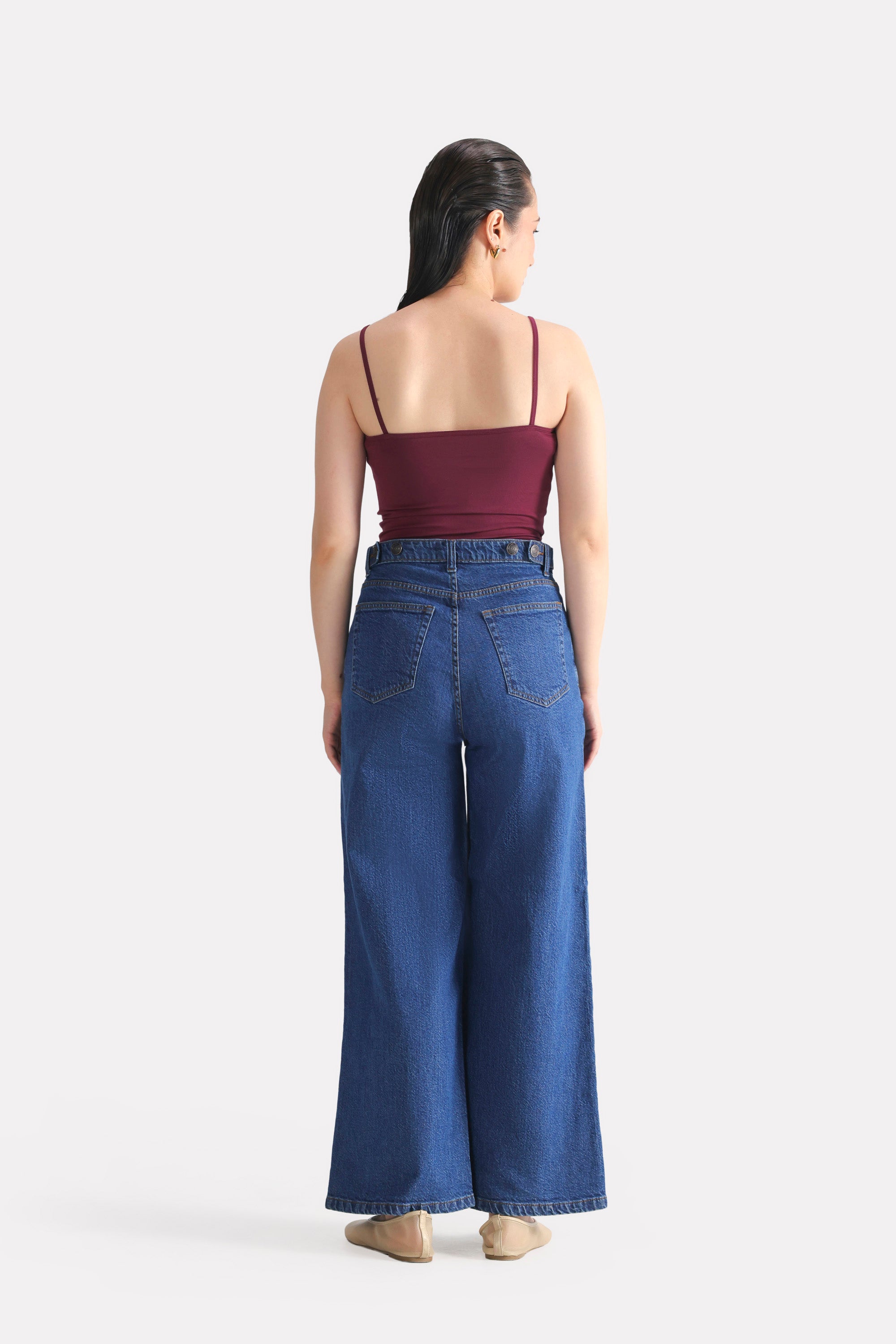 Dark red (burgundy) camisole shown in a styled fit, by SOLA Pakistan.