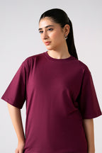 Close-up detail on the dark red (burgundy) round neck t-shirt, by SOLA Pakistan.