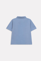 Flat lay of the faded blue (faded denim) jhonny collar polo t-shirt, by SOLA Pakistan.