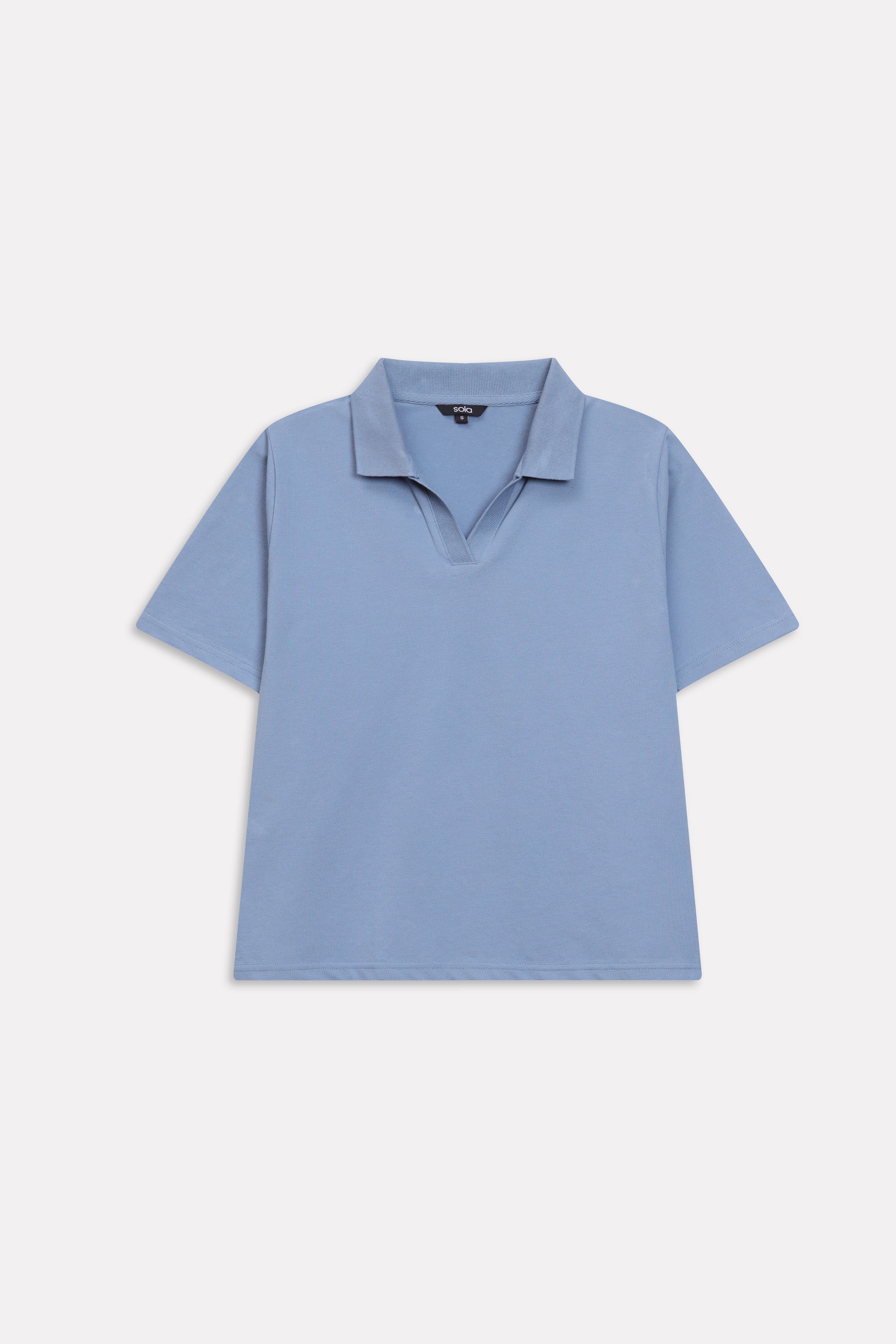 Faded blue (faded denim) jhonny collar polo t-shirt shown in a styled fit, by SOLA Pakistan.