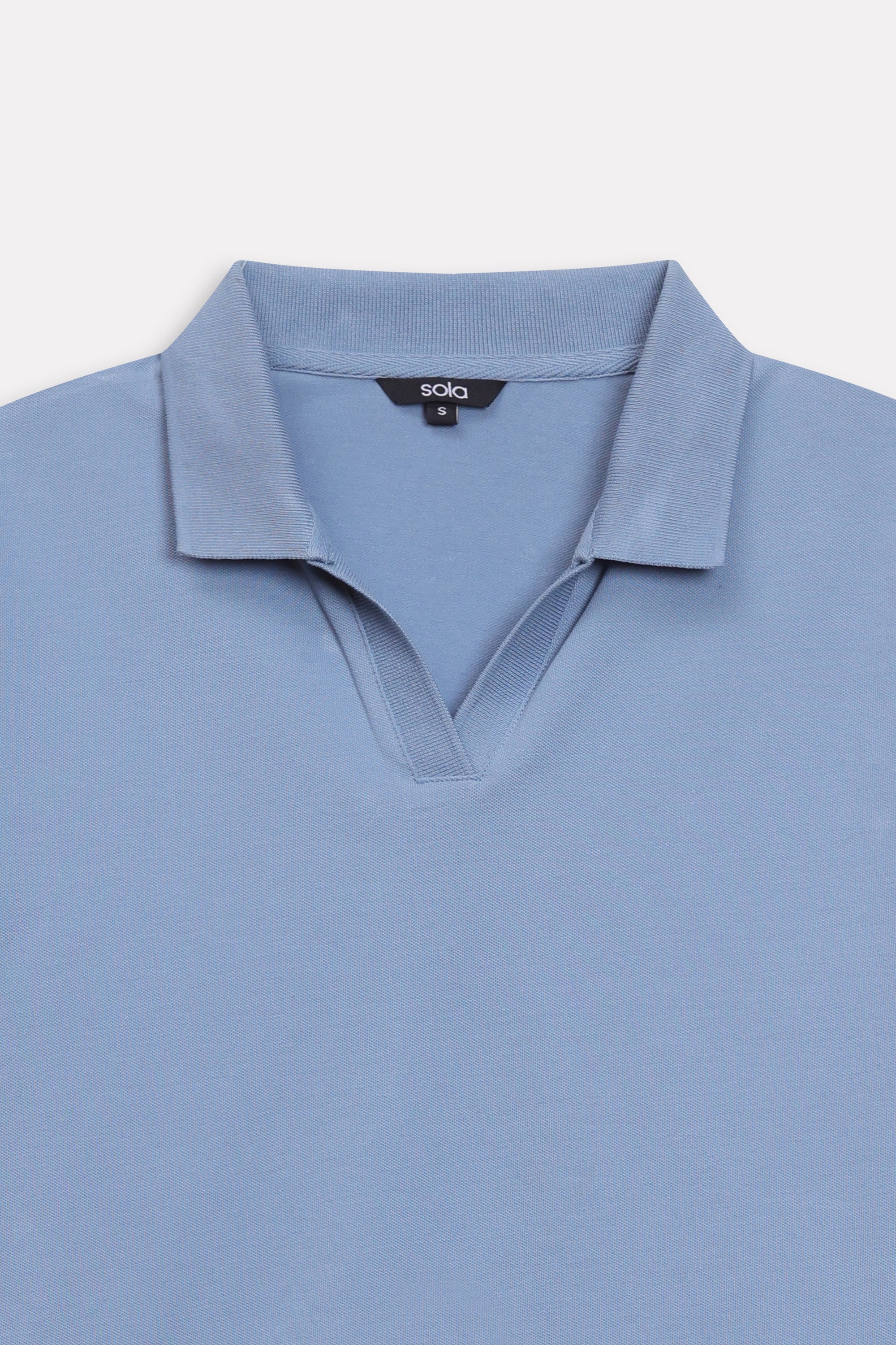 Texture and fabric detail, faded blue (faded denim) jhonny collar polo t-shirt, by SOLA Pakistan.