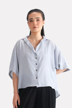 Grey bubble hem oversized top, alternate angle, by SOLA Pakistan.
