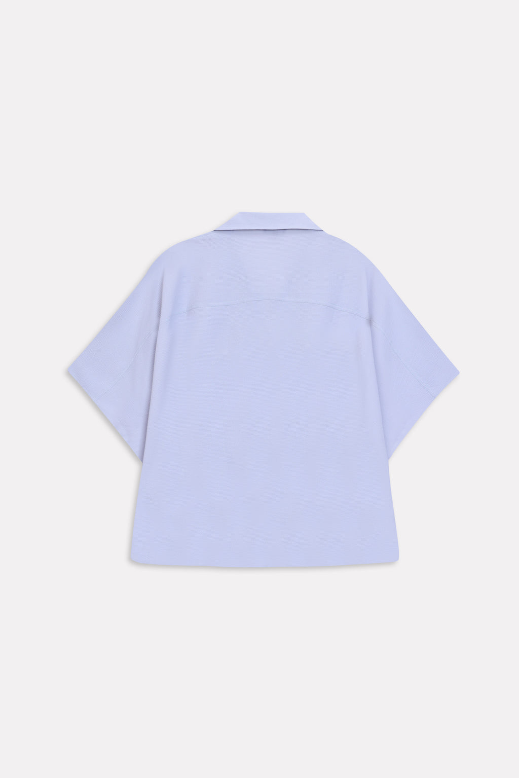 Flat lay of the grey bubble hem oversized top, by SOLA Pakistan.