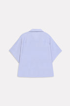 Flat lay of the grey bubble hem oversized top, by SOLA Pakistan.