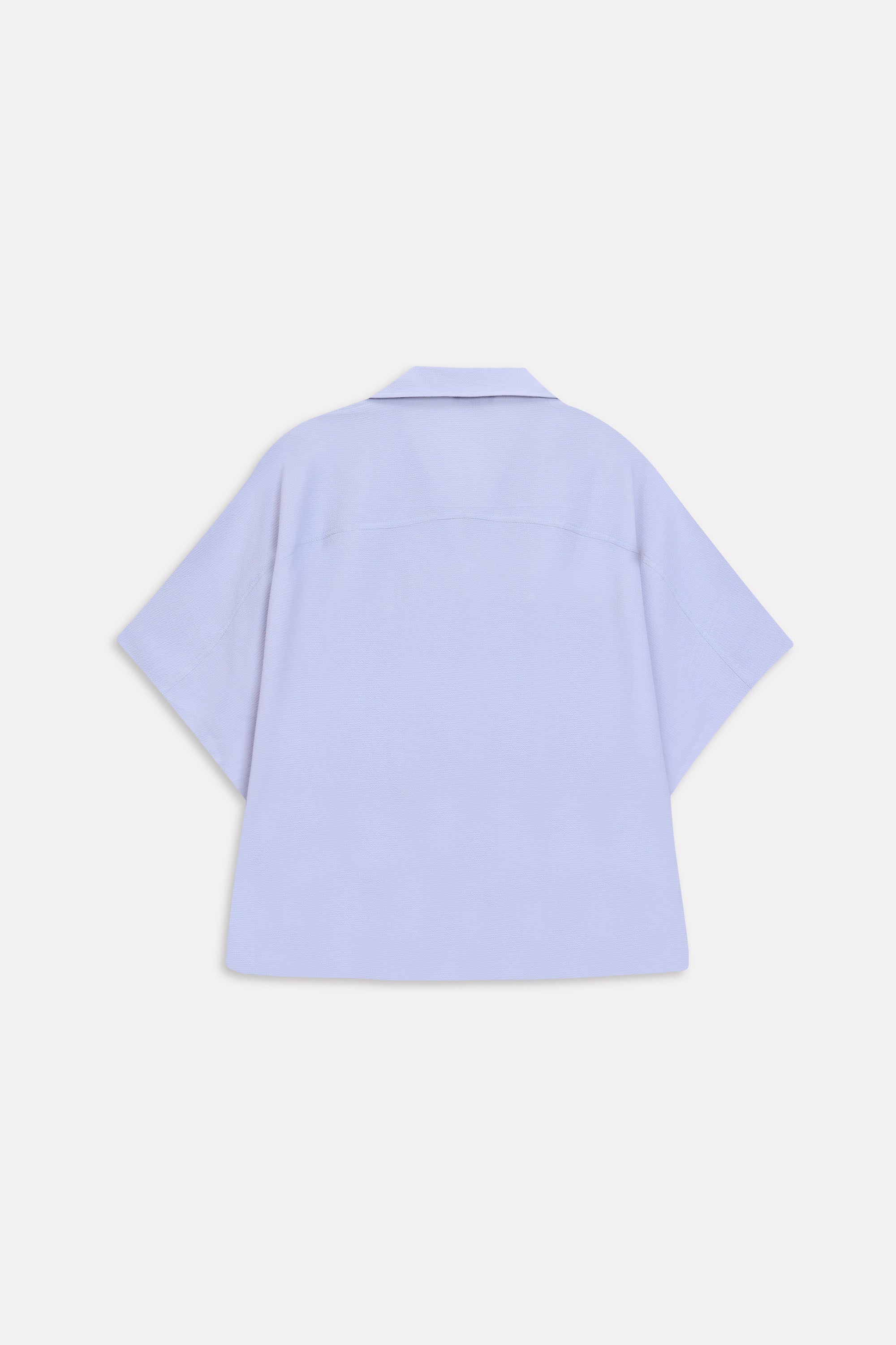 Flat lay of the grey bubble hem oversized top, by SOLA Pakistan.