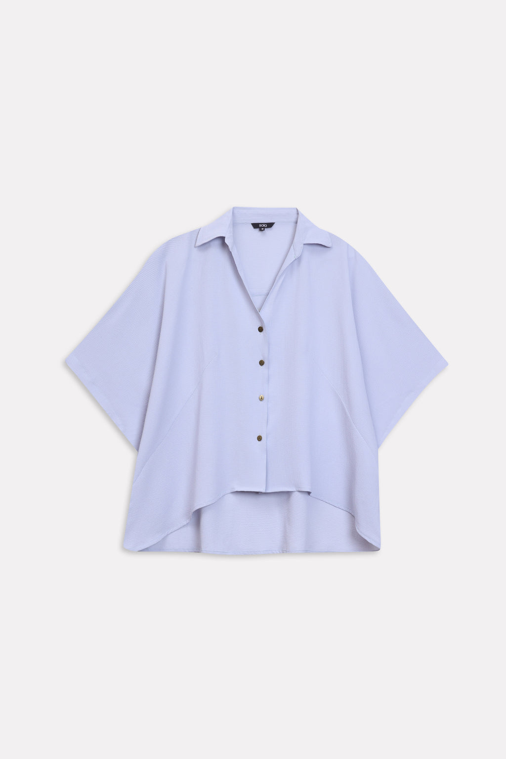 Grey bubble hem oversized top shown in a styled fit, by SOLA Pakistan.