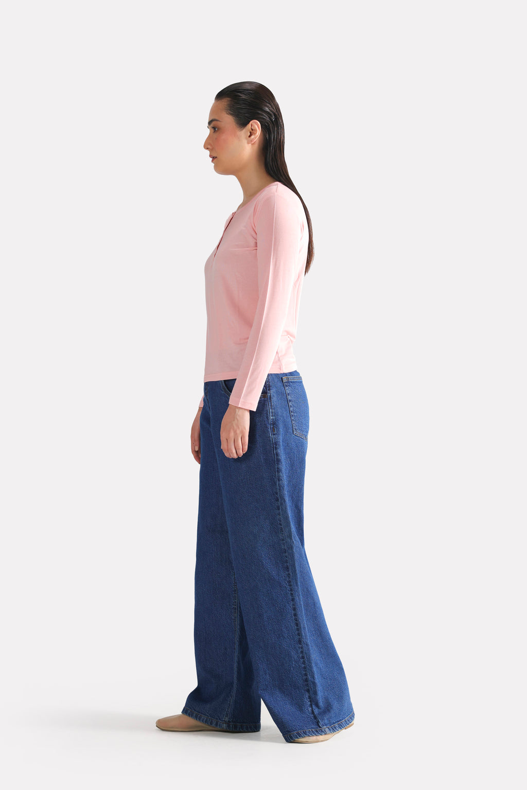 Light pink henley t-shirt, alternate angle, by SOLA Pakistan.
