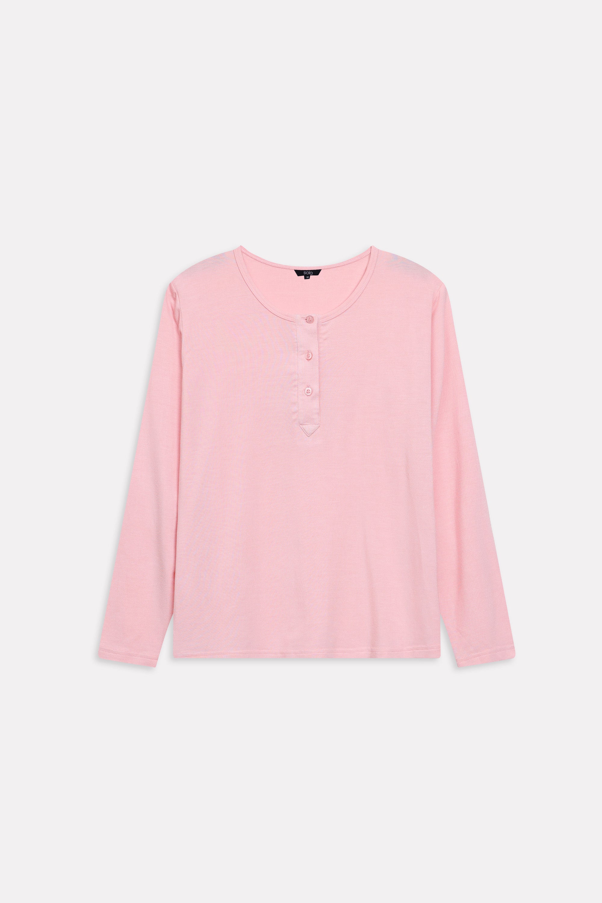 Light pink henley t-shirt shown in a styled fit, by SOLA Pakistan.