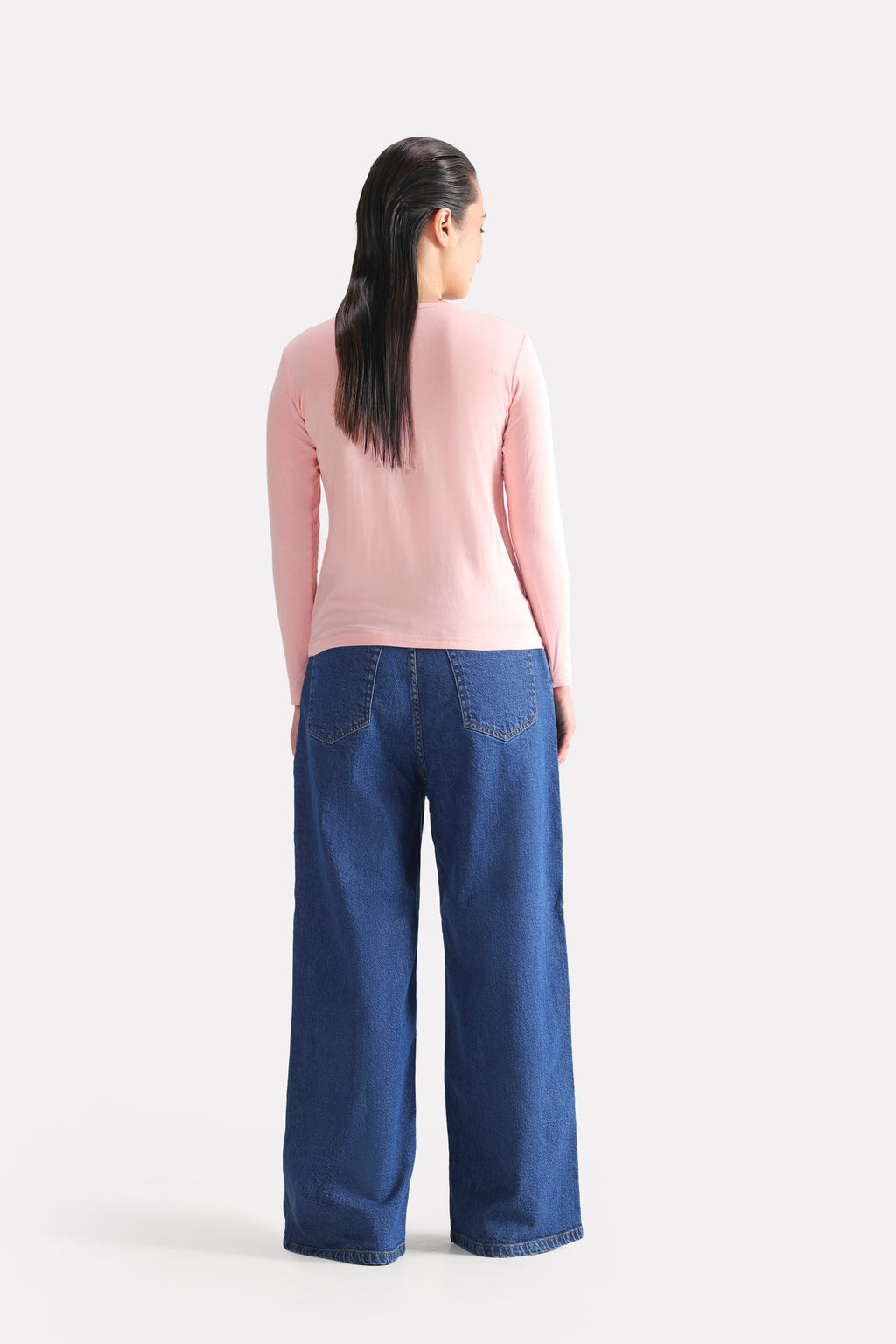 Texture and fabric detail, light pink henley t-shirt, by SOLA Pakistan.