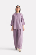 Light purple (lilac) loop & lounge bottom in cotton-linen blend, worn by a model, by SOLA Pakistan.