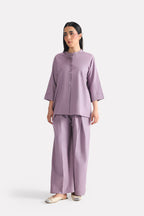 Close-up detail on the light purple (lilac) loop & lounge top, by SOLA Pakistan.