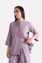 Light purple (lilac) loop & lounge top in cotton-linen blend, worn by a model, by SOLA Pakistan.