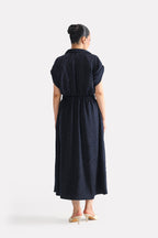 Close-up detail on the mid night blue cap sleeve shift dress, by SOLA Pakistan.