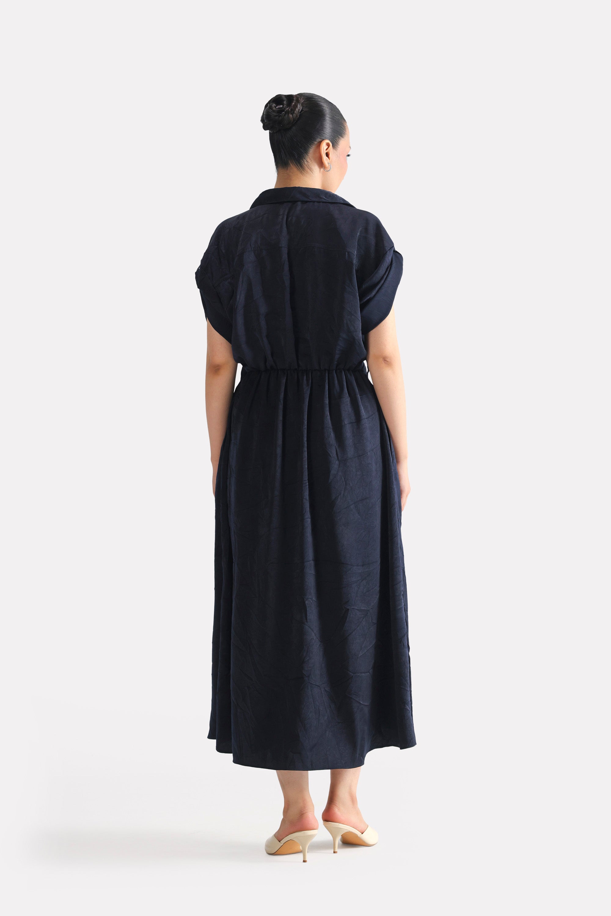 Close-up detail on the mid night blue cap sleeve shift dress, by SOLA Pakistan.