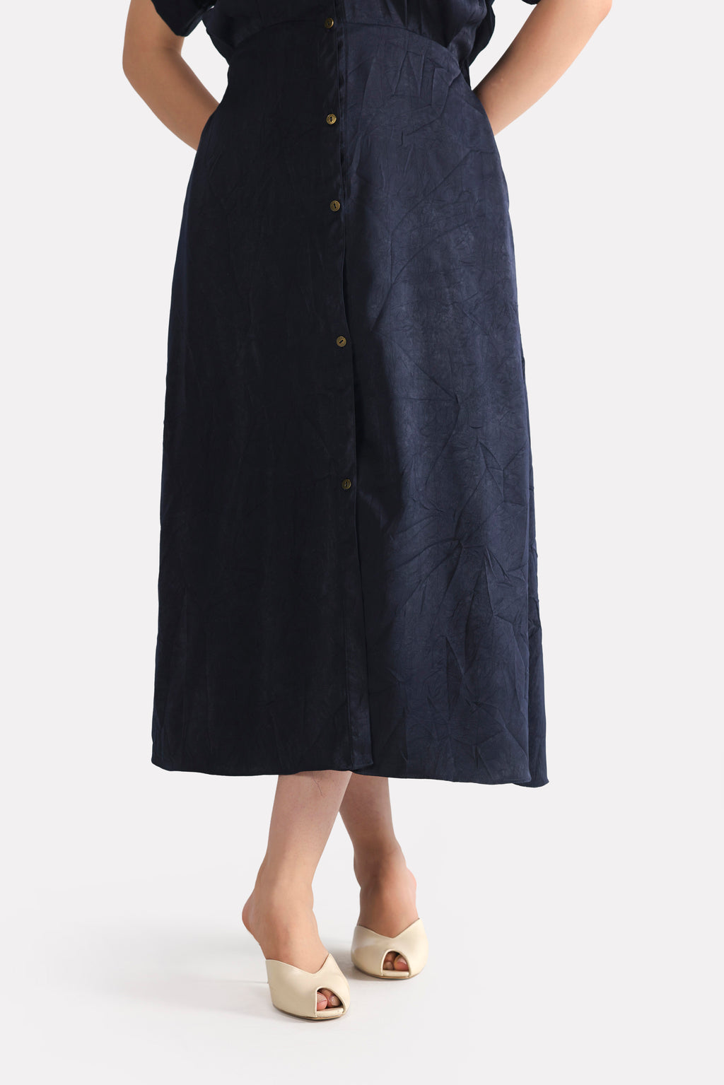 Flat lay of the mid night blue cap sleeve shift dress, by SOLA Pakistan.