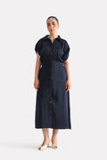 Mid night blue cap sleeve shift dress in polyester-silk blend, worn by a model, by SOLA Pakistan.