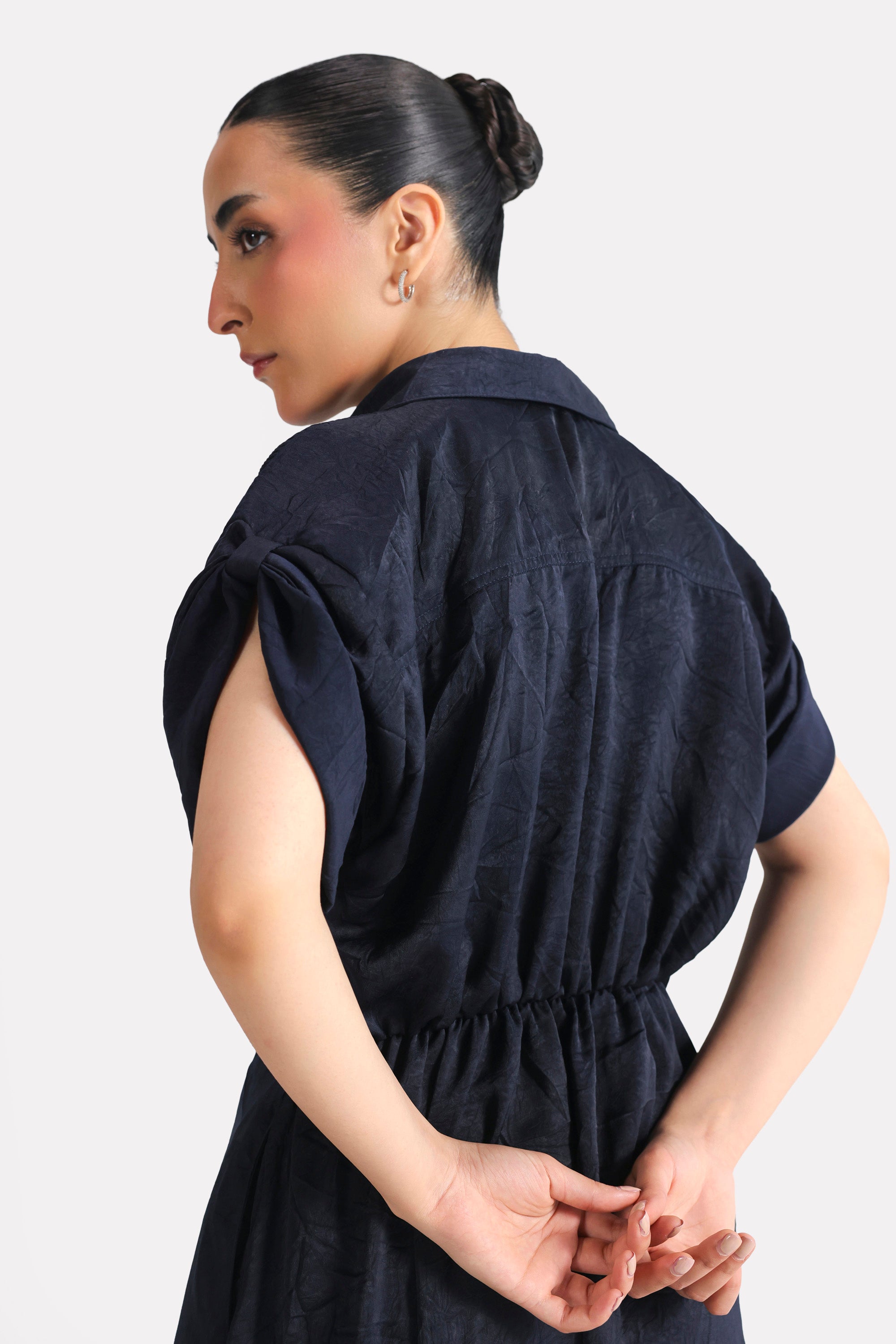 Texture and fabric detail, mid night blue cap sleeve shift dress, by SOLA Pakistan.