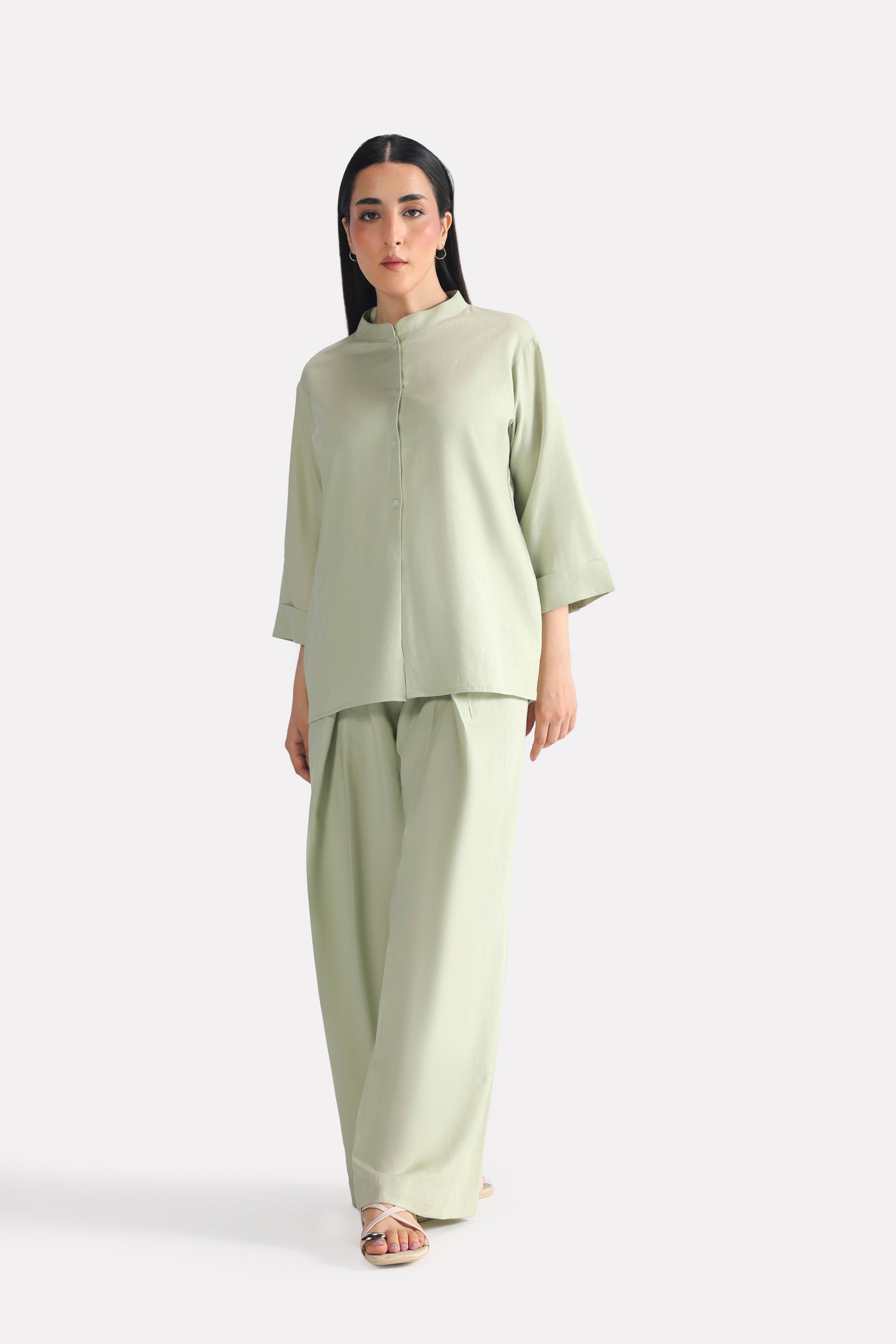 Mint green loop & lounge bottom in cotton-linen blend, worn by a model, by SOLA Pakistan.