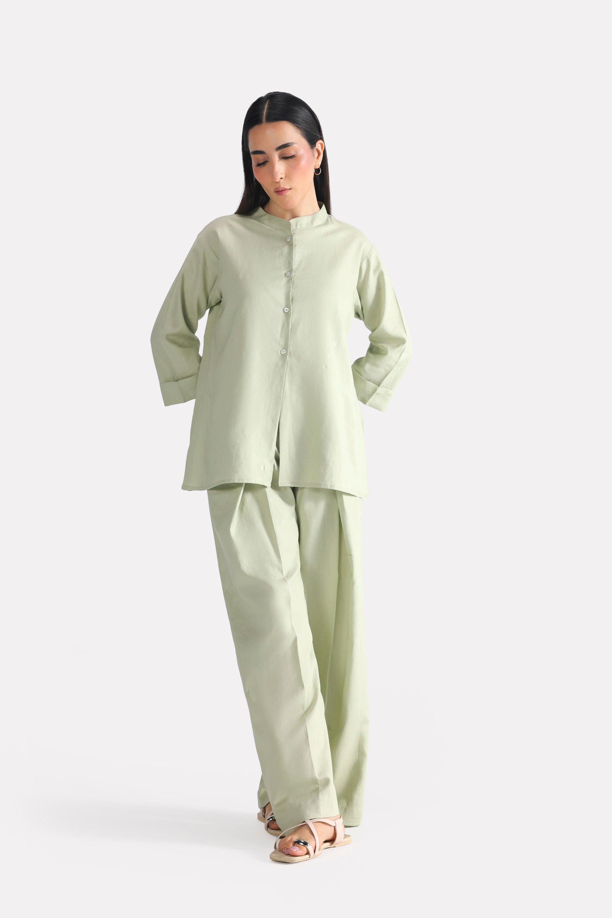 Close-up detail on the mint green loop & lounge top, by SOLA Pakistan.