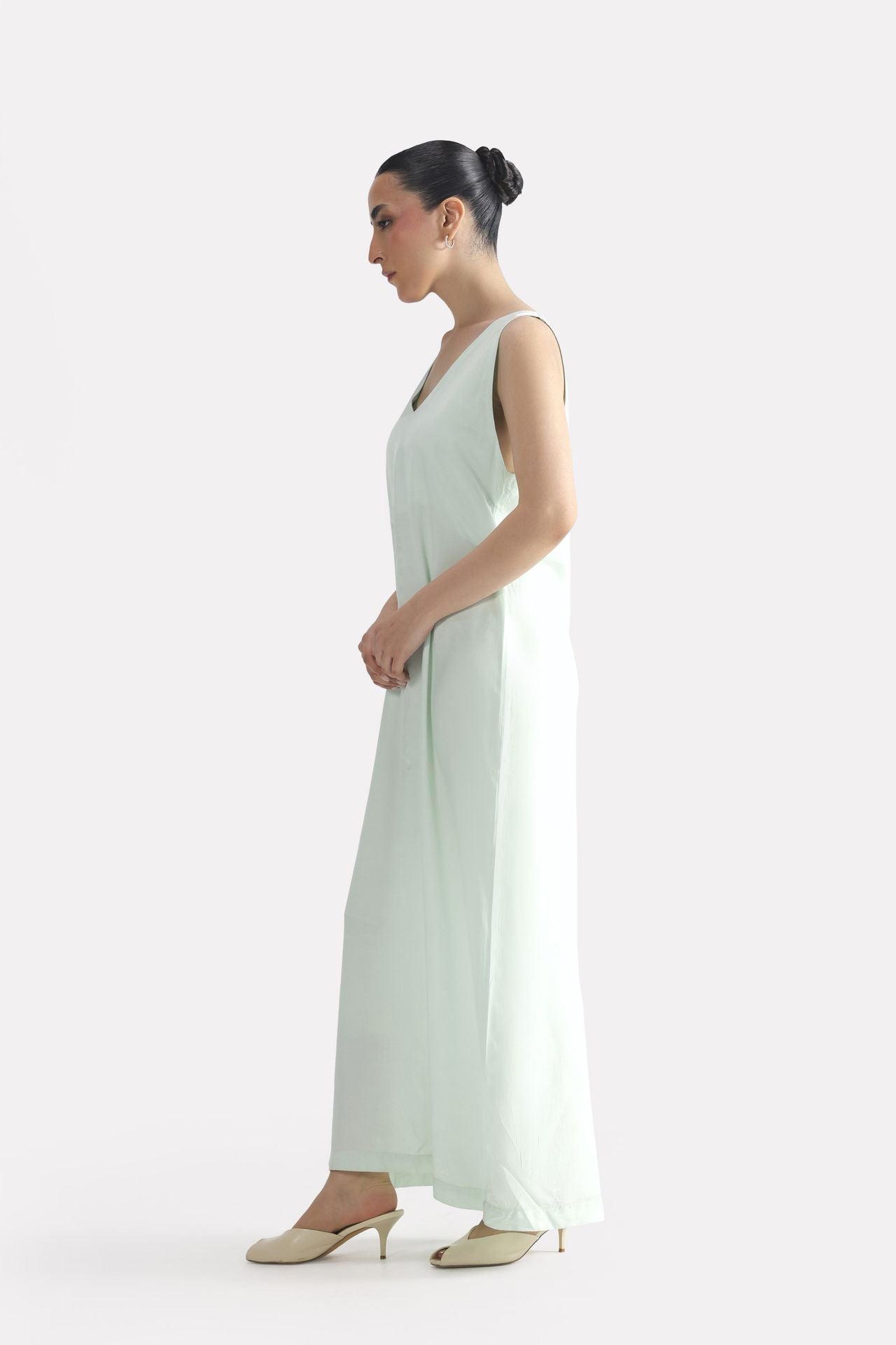 Mint green lyocell slip maxi dress, full styled look, by SOLA Pakistan.