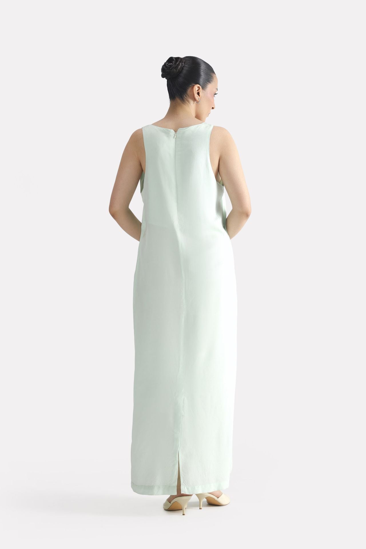 Mint green lyocell slip maxi dress shown in a styled fit, by SOLA Pakistan.